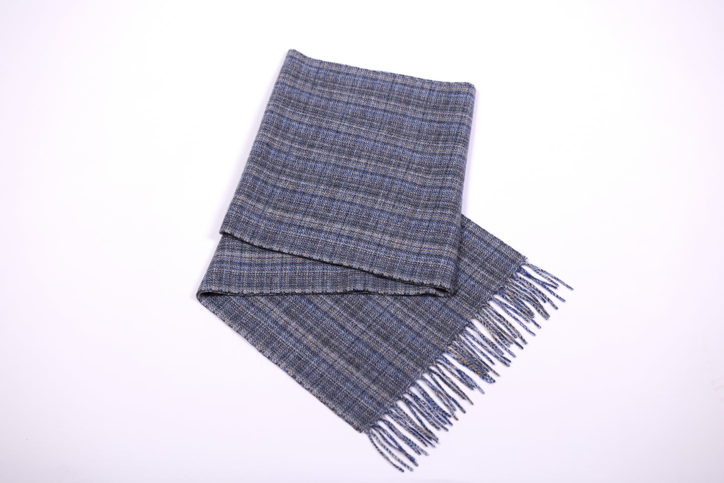 This scarf is a unisex 100% cashmere woven scarf, featuring a classic plaid pattern with a mix of pink, purple, and gray tones.